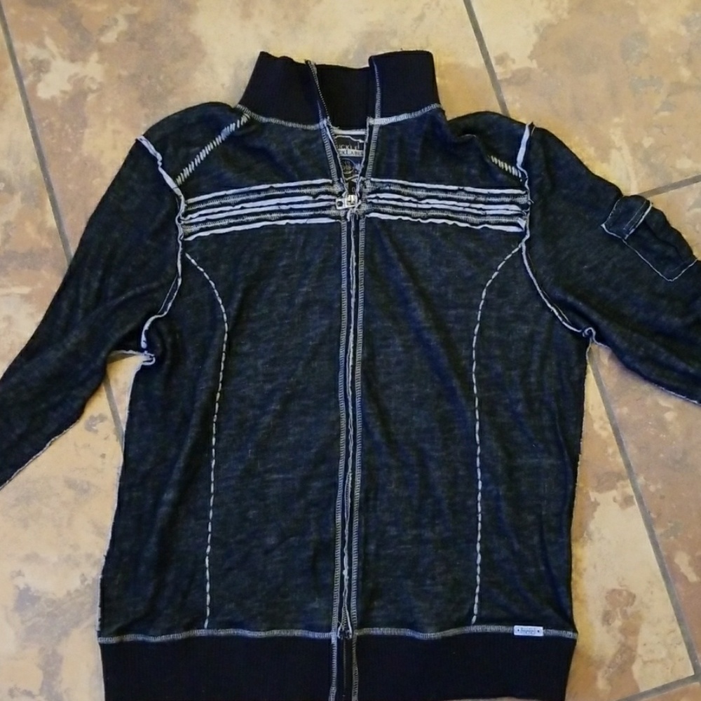 Light weight zip up sweater.